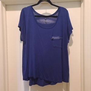 Blue top with zipper detail on pocket